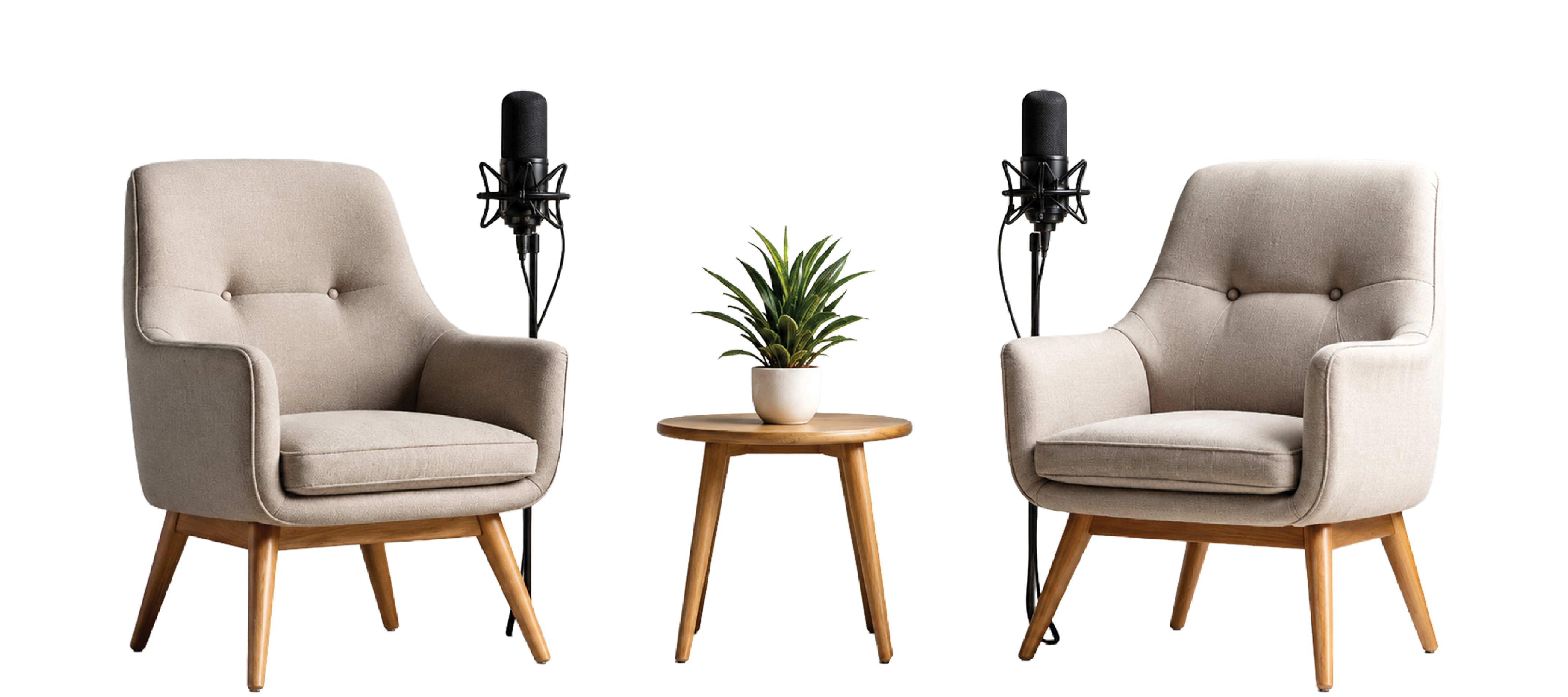 Two podcast chairs, microphones, and a table in the studio
